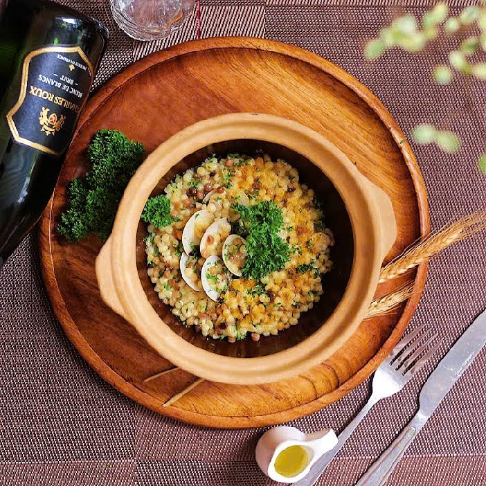 Authentic Sardinian Cuisine in Da Nang – Fregula pasta with clams and bottarga served at AJO Italian Trattoria